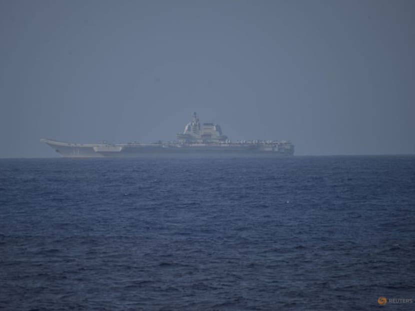 FILE PHOTO: Chinese aircraft carrier Shandong sails in Pacific Ocean waters, about 300 kms (186 miles) south of Okinawa prefecture, Japan, in this handout image taken by Japan Self-Defence Force on April 5, 2023 and released by the Joint Staff Office of the Defense Ministry of Japan April 6, 2023. Joint Staff Office of the Defense Ministry of Japan/HANDOUT via REUTERS 