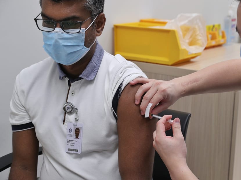 Dr Kalisvar Marimuthu, an NCID senior consultant, getting vaccinated on Dec 30, 2020.