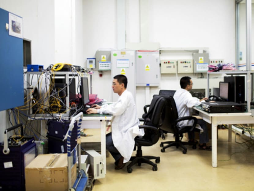Engineers working at the global compliance and testing centre at Huawei Technologies’ campus in Shenzhen. Chinese firms such as Huawei have begun to gain local market share at foreign rivals’ expense. Photo: Bloomberg
