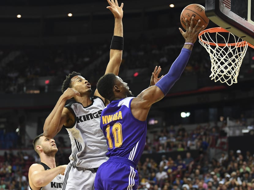 Los Angeles Lakers guard David Nwaba (10) shoots inside the defense of Sacramento Kings forward Skal Labissiere (3) during an NBA Summer Leage game at Thomas & Mack Center. Photo: USA TODAY Sports
