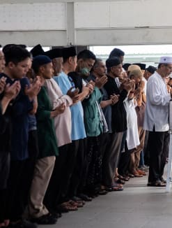 Mourners attend the burial ceremony of Afifah Munirah Muhammad Azril on Tuesday (April 23). She was one of the two victims who died in the Tampines accident on April 22, 2024. 