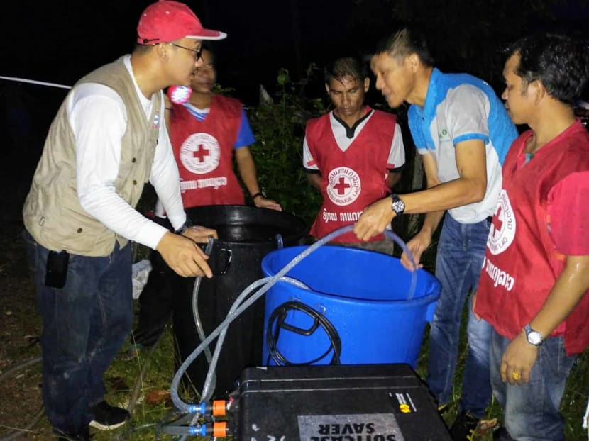 Two Singaporean firms, HSL Constructor and Aquayana, worked together to donate portable ultra-filtration and water treatment systems for flood-hit communities at Sanamxay district in southern Laos to get safe drinking water.