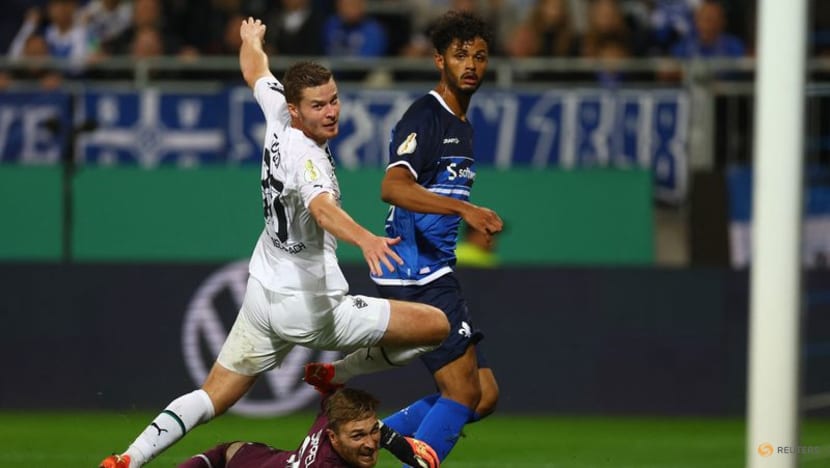 Soccer-Gladbach crash out of German Cup to second tier Darmstadt Soccer-Gladbach crash out of German Cup to second tier Darmstadt