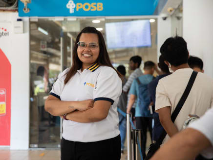 Gen Y speaks writer Rishma Theru, 28, poses for a photo at the POSB Work Permit Account Service Centre on March 27, 2024. She is a business manager for the Work Permit segment at DBS Bank's Consumer Banking Group where she works with migrant workers.