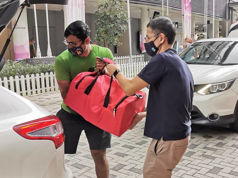 Standard Chartered, Sheng Siong and more distribute Hari Raya care packs 