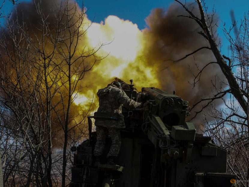 Ukrainian servicemen fire a 2S5 Giatsint-S self-propelled howitzer towards Russian troops outside the frontline town of Bakhmut, amid Russia's attack on Ukraine, in Donetsk region, Ukraine March 5, 2023.  