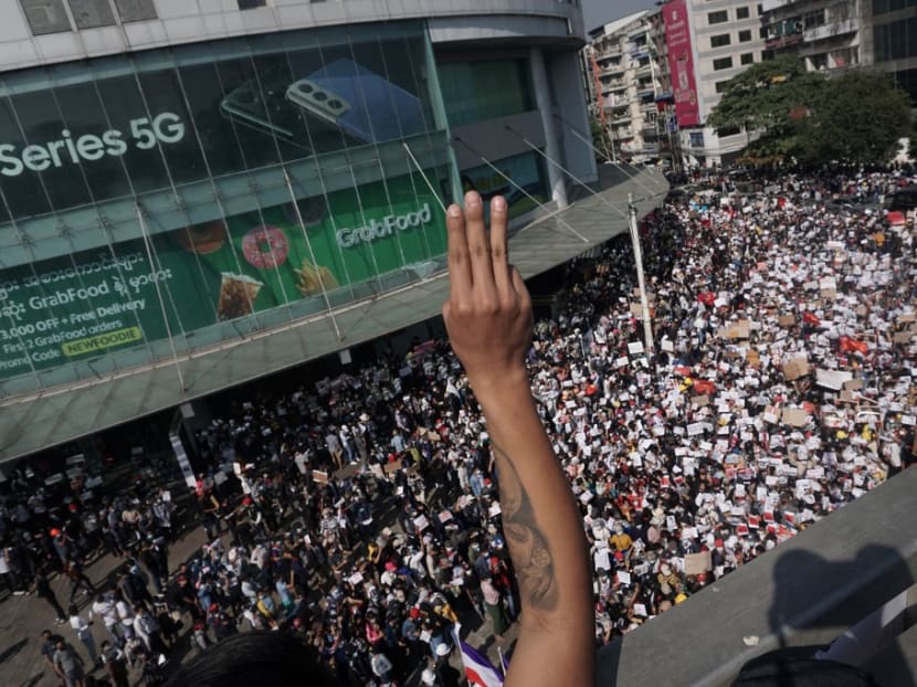 Protesters take part in a demonstration against the military coup in Yangon on Tuesday, Feb 9, 2021. Protesters take part in a demonstration against the military coup in Yangon on Tuesday, Feb 9, 2021.