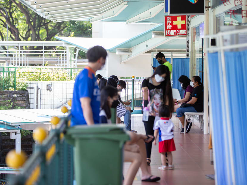 Patients are seen outside a clinic in Tiong Bahru.