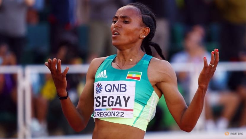 Ethiopia's Tsegay holds on to win world 5,000m gold Ethiopia's Tsegay holds on to win world 5,000m gold
