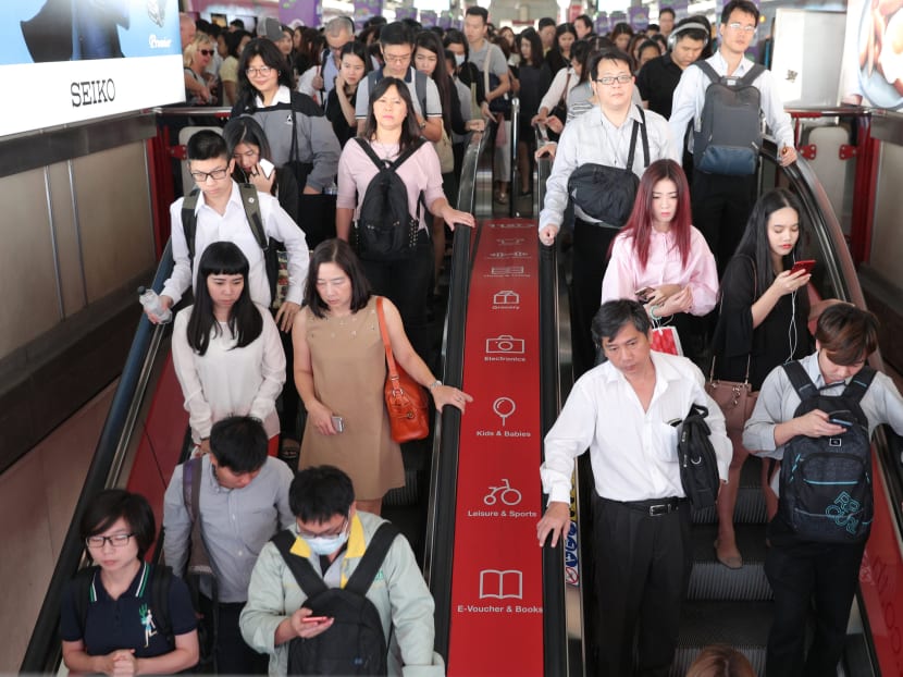 Thai commuters during rush hour at a Bangkok skytrain station. The author says that the more the Prayuth government tries to hang on to power, the less popular it will become. Photo: Reuters
