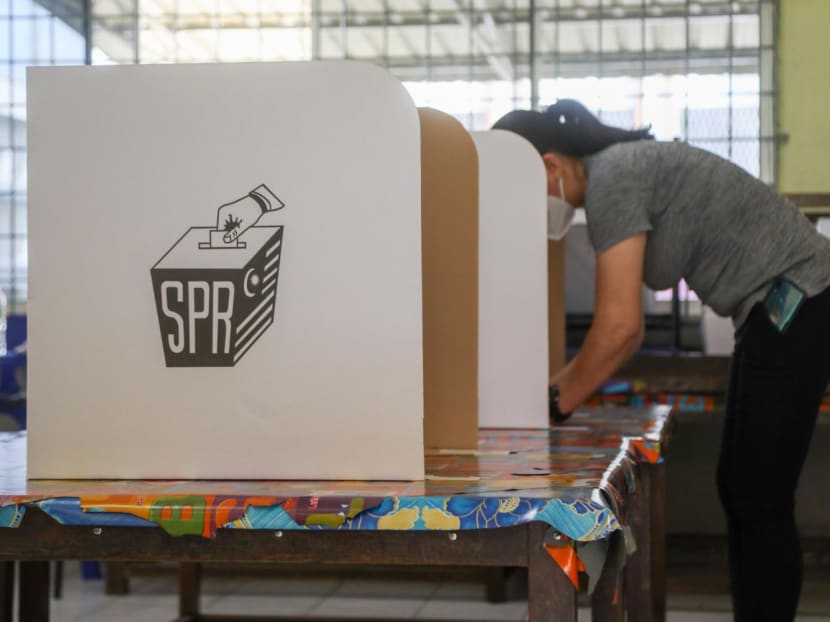 A voter in a voting booth in Padawan, Kuching, on Nov 19, 2022.