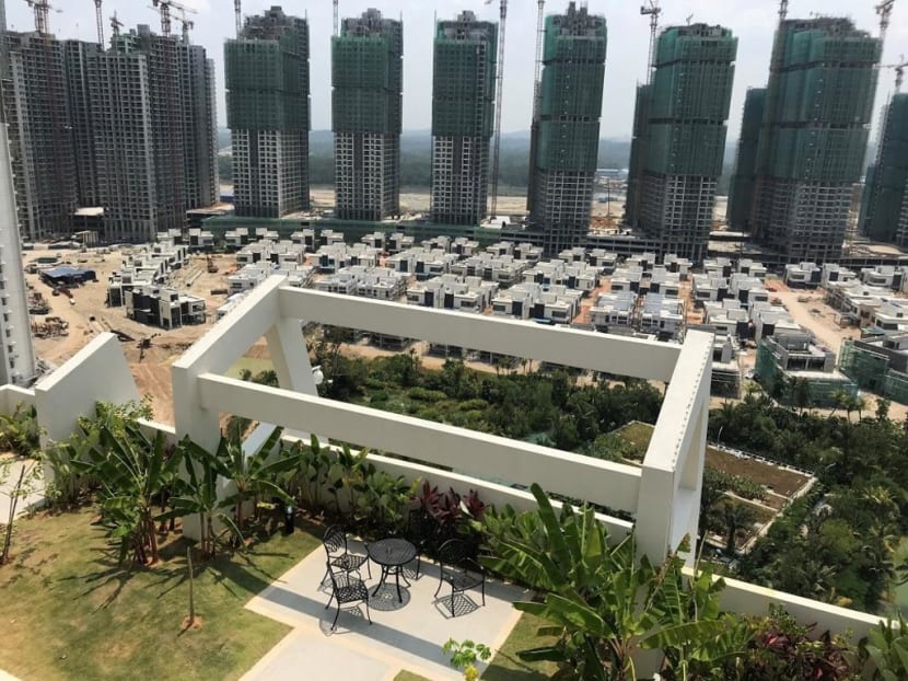 Dr Mahathir Mohamad explained that the move to allow foreigners to buy condominiums and apartment units was due to a huge property overhang nationwide. Dr Mahathir Mohamad explained that the move to allow foreigners to buy condominiums and apartment units was due to a huge property overhang nationwide.