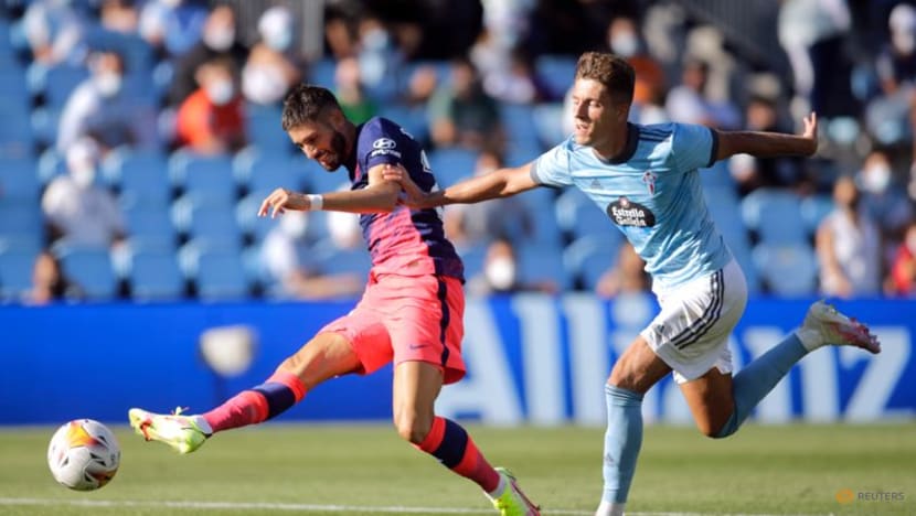 Football: Champions Atletico beat Celta in LaLiga opener as both sides see red Football: Champions Atletico beat Celta in LaLiga opener as both sides see red