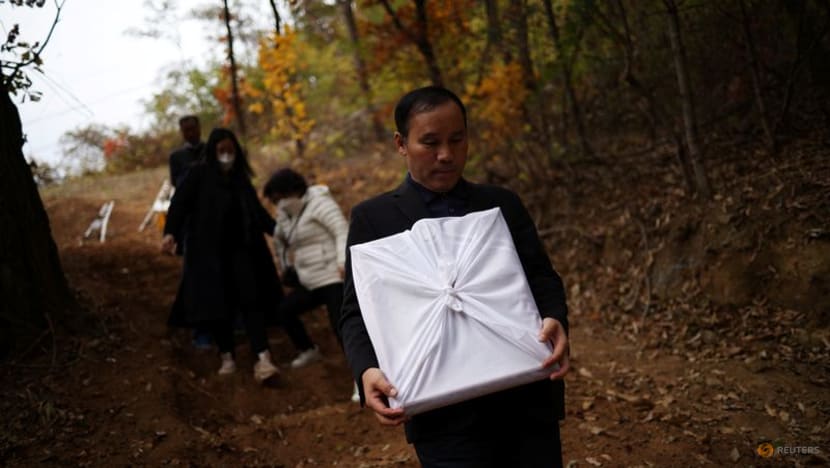 Tears, anger as South Korean parents bury Seoul crowd crush victims
