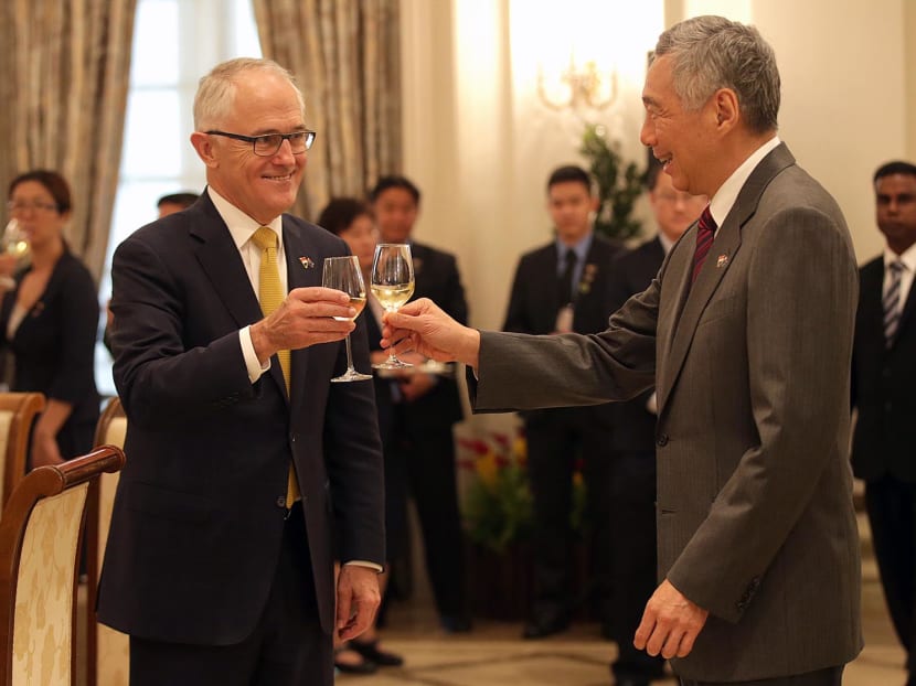 Australian Prime Minister Malcolm Turnbull shares a toast with Singapore Prime Minister Lee Hsien Loong at the Istana presidential palace in Singapore on June 2, 2017. Photo: Wee Teck Hian/TODAY