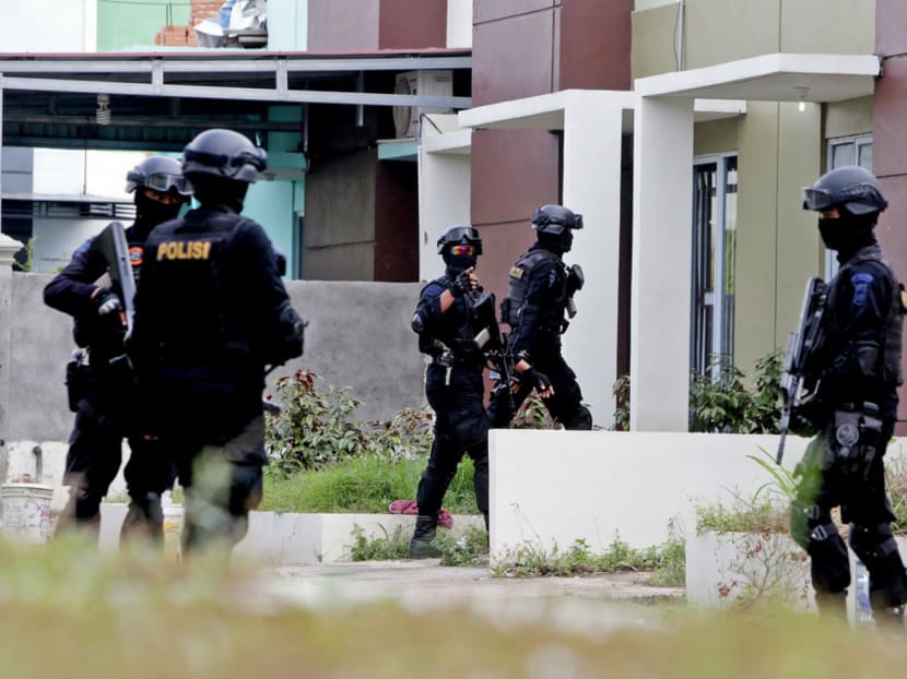 Indonesia’s anti-terror police during a raid in Batam last month. They had already arrested six men on suspicion of being involved in the rocket plot prior to arresting LH. Photo: Reuters
