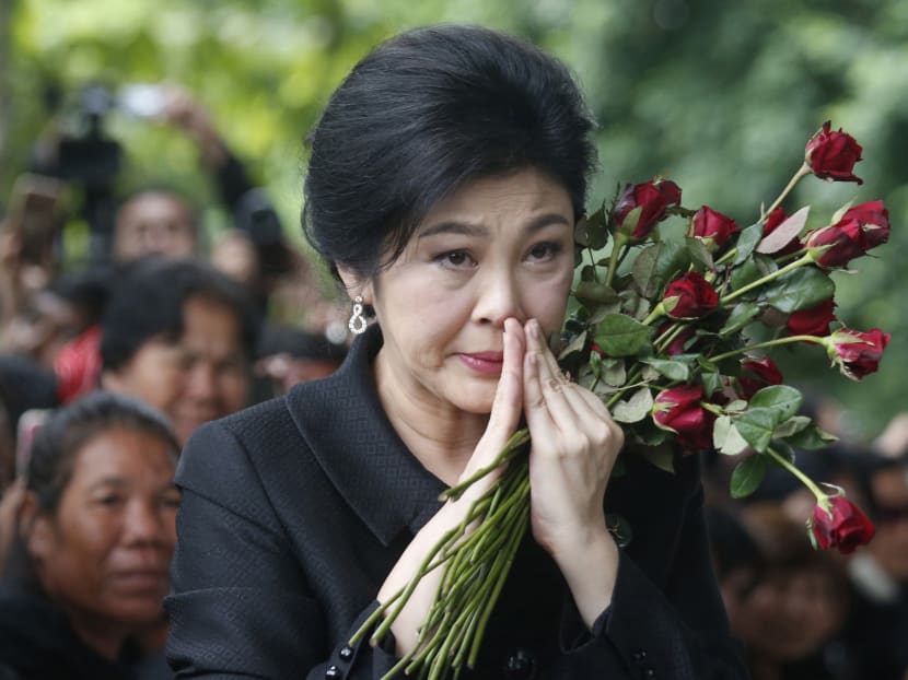 The police panel set up to probe into the police officers who allegedly helped former prime minister Yingluck Shinawatra's escape a Supreme Court ruling is coming under criticism for its trustworthiness. Photo: AP