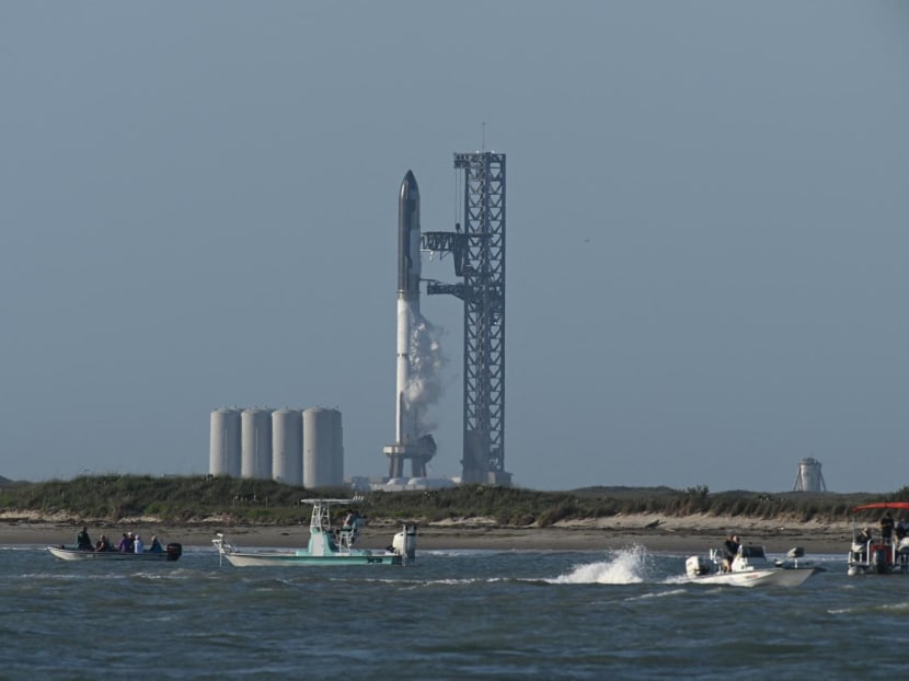 The SpaceX Starship rocket stands on the launchpad from the SpaceX Starbase in Boca Chica as seen from South Padre Island, Texas on April 17, 2023.