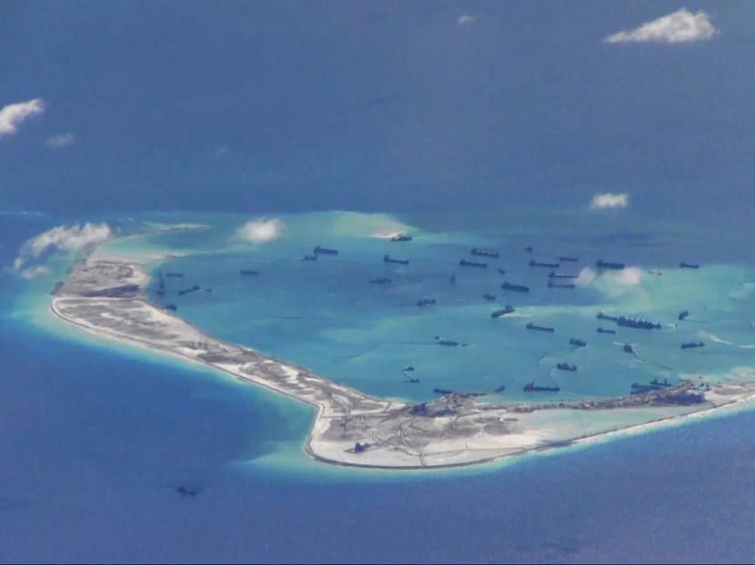 File photo of Chinese dredging vessels purportedly seen in the waters around Mischief Reef in the disputed Spratly Islands in the South China Sea. Photo: US Navy via Reuters