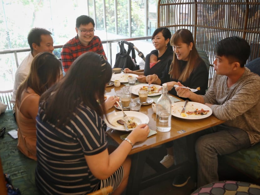 Some people took the opportunity to gather in bigger groups on Dec 28, 2020, including Mr Tan Jun Hao (far right) and six friends at Wild Honey cafe in Scotts Square.
