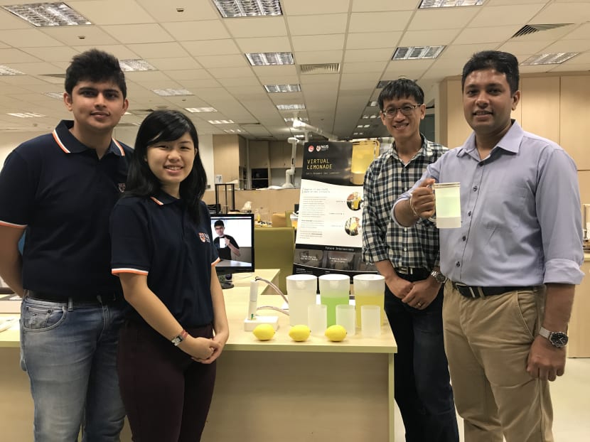 Lead project researcher Dr Nimesha Ranasinghe (right) with the rest of the team (from left: Research engineer Pravar Jain, research assistant Shienny Karwita Tailan. and principal investigator Associate Professor Yen Ching-Chuan. Photo: Raymond Tham/TODAY