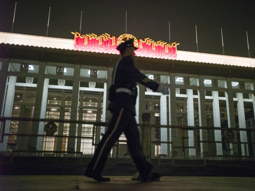 A guard walking in Tiananmen Square as a key conclave of the Communist Party of China kicked off yesterday in Beijing. Nearly 400 top partymembers gathered at the exclusive Jingxi Hotel to discuss changes to party structure and management for four days. Photo: AFP