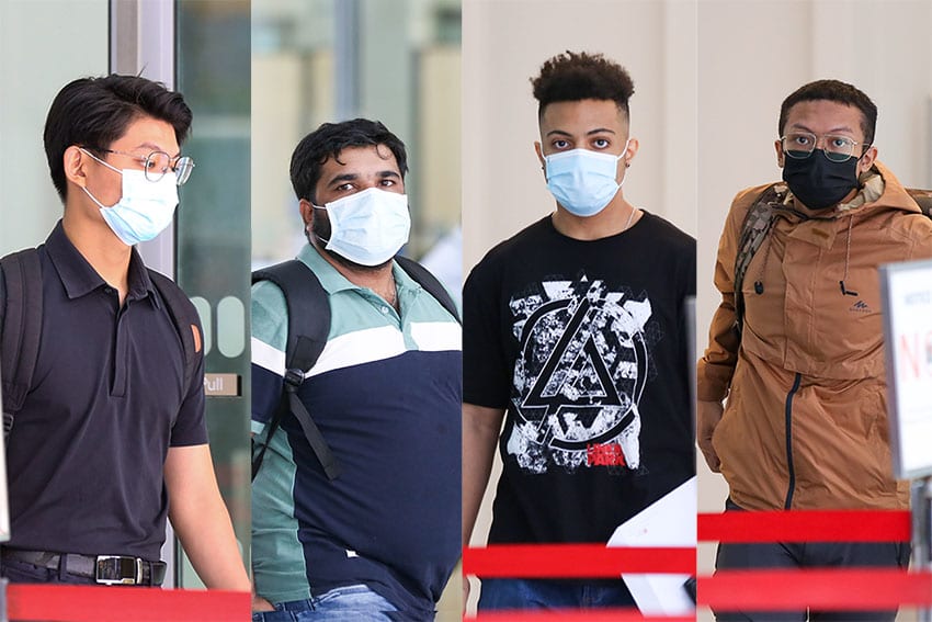 Four more people were charged on Tuesday (March 22) with breaching multiple Covid-19 regulations during an impromptu New Year’s Eve gathering at Clarke Quay. L-R: Lee Hern Sing, Varghese Divin, Adam Abdullah, Assiddiq Surani. 