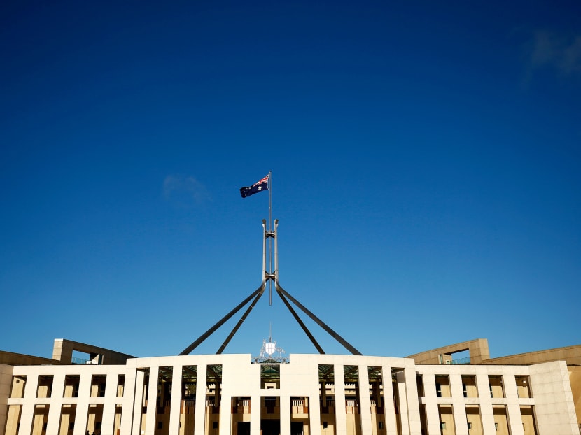 The Australian flag flies above Parliament House in Canberra. Roughly 94 per cent of Parliament is of Anglo-Celtic or European heritage, making the body more white than the United States Congress and the British Parliament.