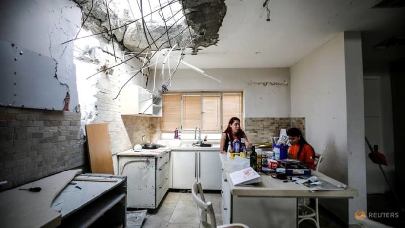 Kitchen smashed and sirens sounding, Israeli family holds on after rocket hits Kitchen smashed and sirens sounding, Israeli family holds on after rocket hits