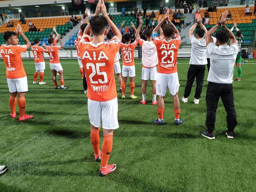 Hougang United players thanking supporters after defeating Geylang International 4-1 in a Singapore Premier League match in April.