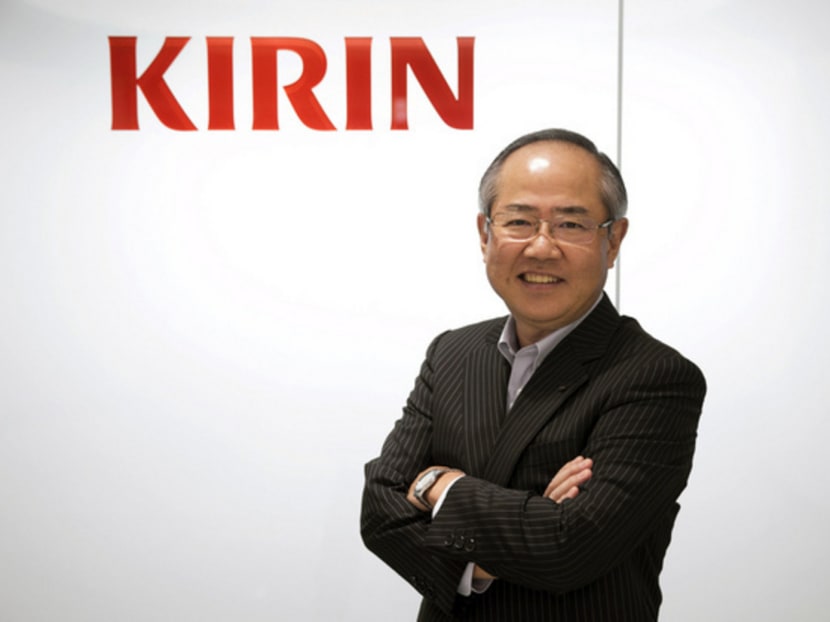 Mr Yoshinori Isozaki (picture) is the president and chief executive of Kirin Holdings, which, like many Japanese firms, is looking to expand abroad amid weak sales in a shrinking domestic market. Photo: REUTERS