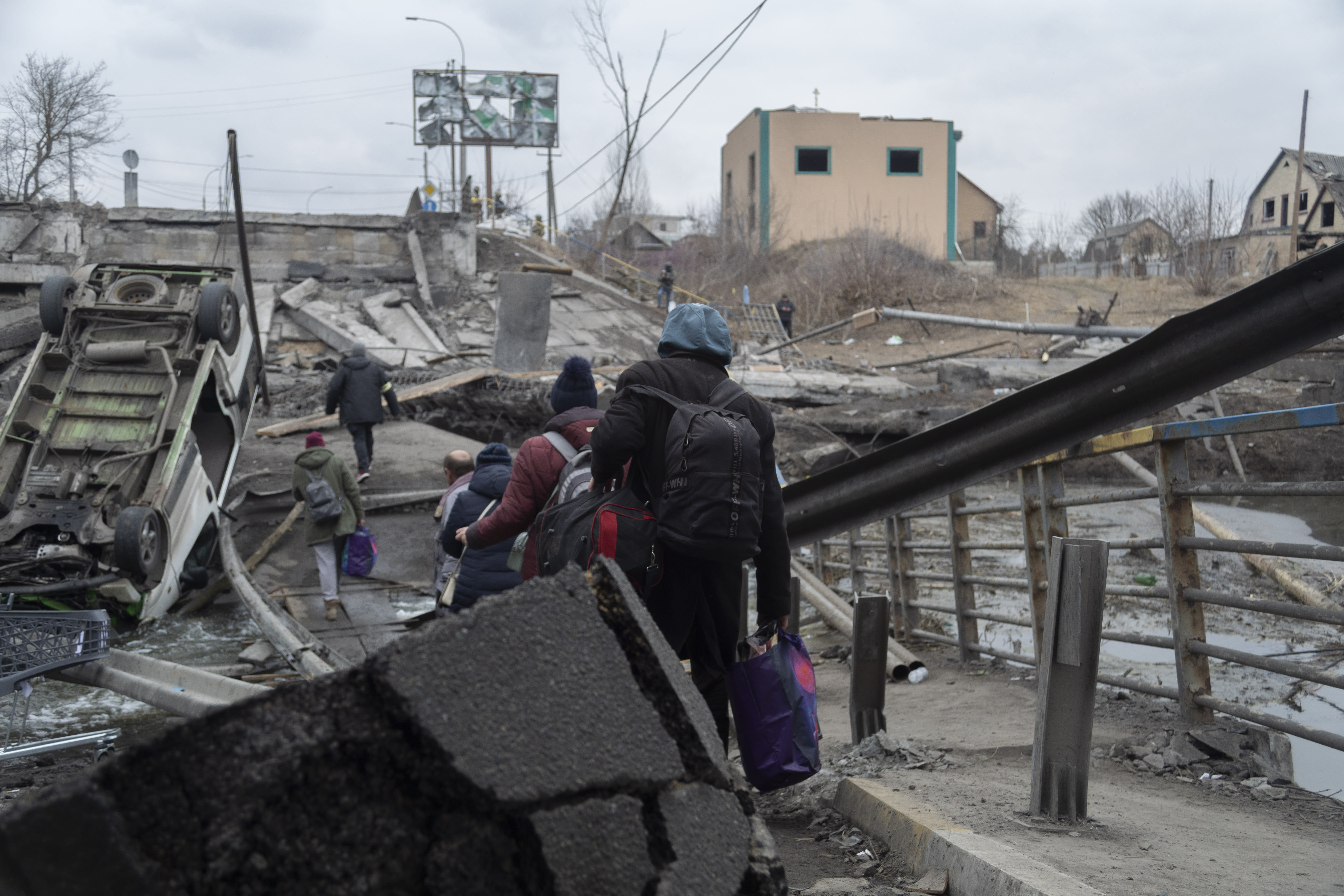 Civilians fleeing Irpin, near Kyiv, Ukraine, on March 6, 2022.