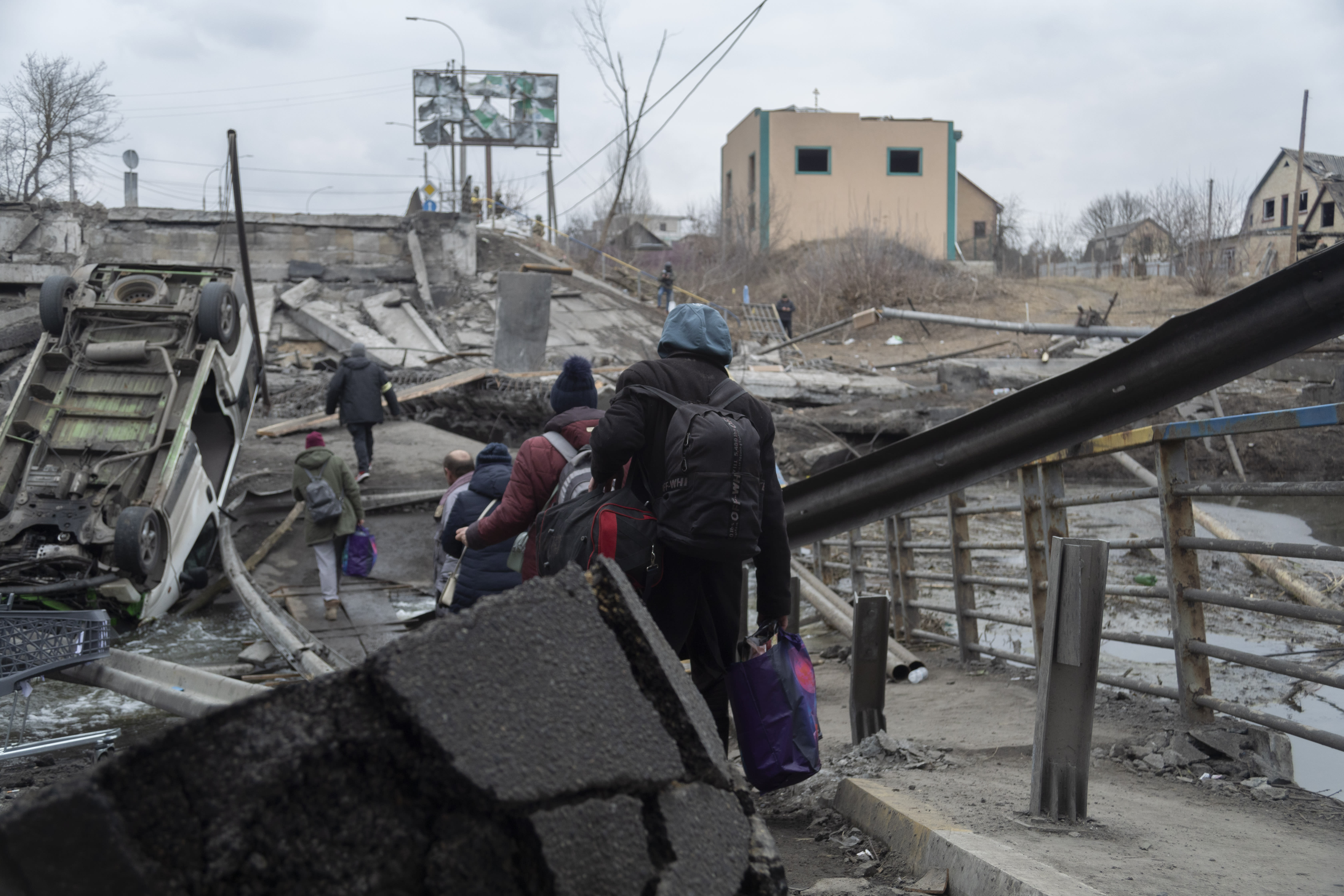 Civilians fleeing Irpin, near Kyiv, Ukraine, on March 6, 2022. Civilians fleeing Irpin, near Kyiv, Ukraine, on March 6, 2022.