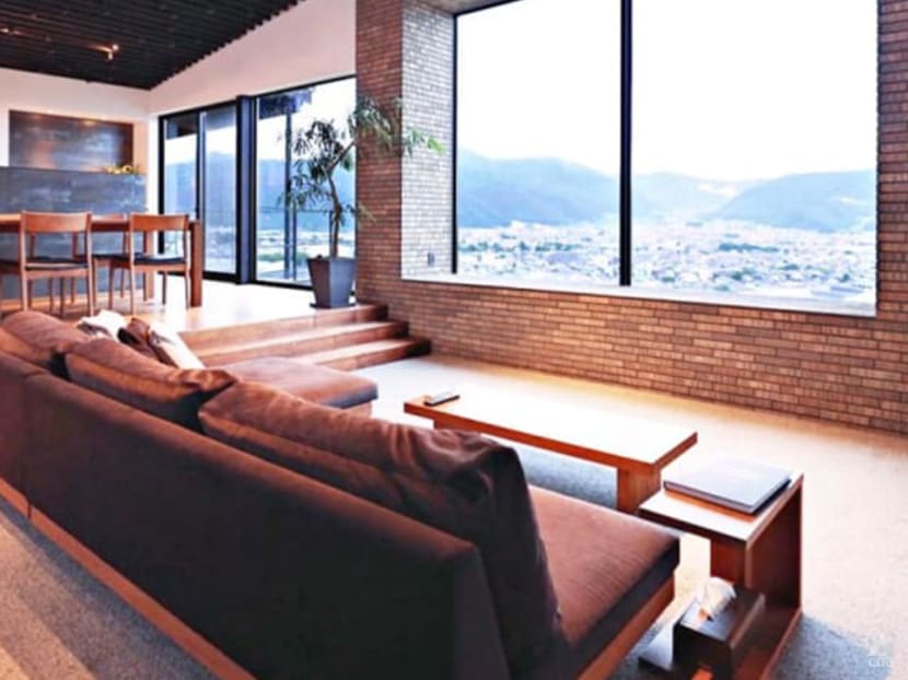 This two-building residence in Japan uses shadows and light to create a rhythm in the living spaces This two-building residence in Japan uses shadows and light to create a rhythm in the living spaces