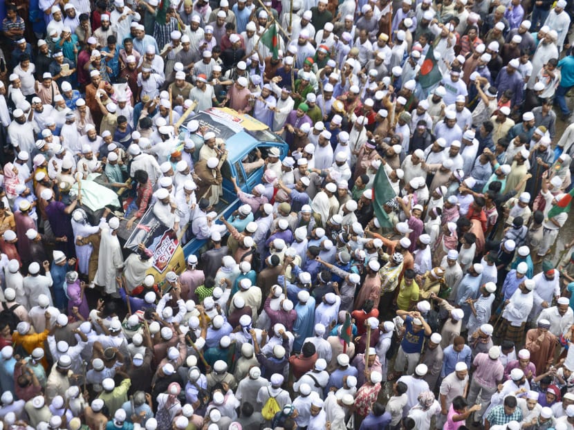 Hefazat-e-Islam supporters gathering in Dhaka in 2013 to protest against aethist groups, bloggers and other issues. The Islamic organisation first called for changes to the textbooks during huge rallies in 2013. Photo: AP