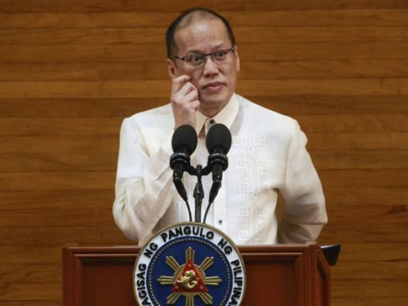 Philippine President Benigno Aquino gestures while delivering his last State of the Nation Address (SONA) during the joint session of the 16th Congress at the House of Representatives in Quezon city, metro Manila, on July 27, 2015. Photo: Reuters