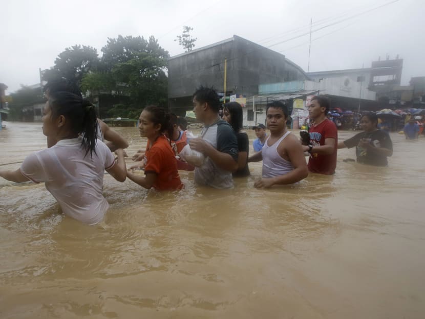 Floods shut down Philippine capital, 3 killed