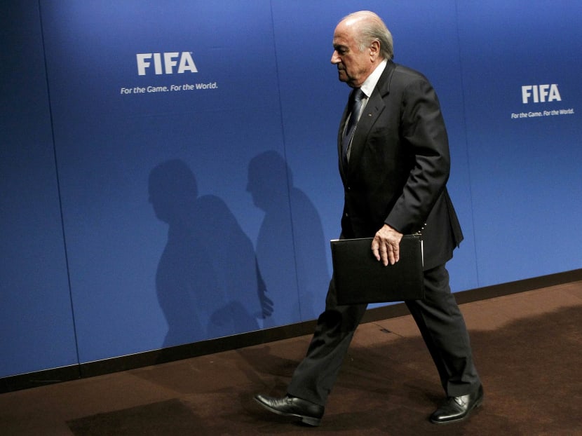 FIFA President Sepp Blatter leaves after a news conference at the FIFA headquarters in Zurich in this May 30, 2011 file picture. Photo: Reuters