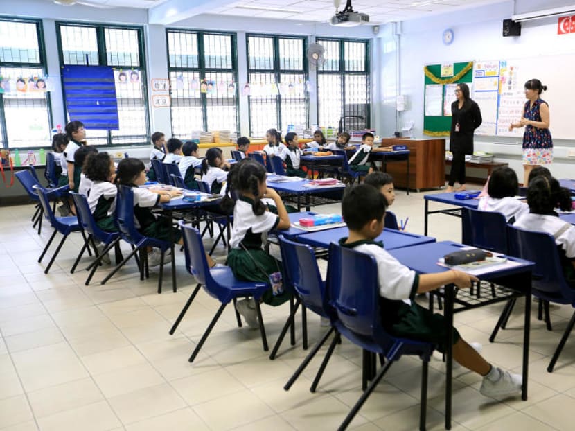 Students attending a class in a primary school in Singapore. A July 2017 nationwide survey has found that parents’ idea of a good school is one where teachers care about their students’ social-emotional development. TODAY file photo