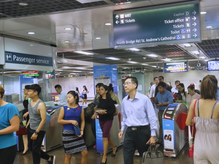 Commuters at City Hall MRT Station on July 8, 2015, a day after a massive breakdown on the North-South and East-West Lines. TODAY file photo