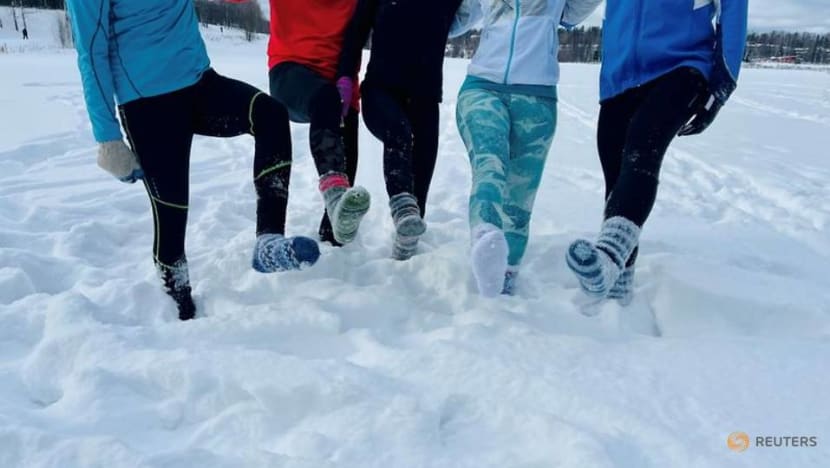 Weary of COVID restrictions, Finns take up running in deep snow in socks Weary of COVID restrictions, Finns take up running in deep snow in socks