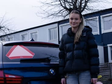 Ms Evelina Christiansen, 15, posing next to a car in Huddinge, Sweden, on Feb 10, 2023.
