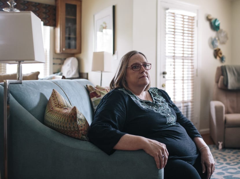 Ms Patty Nece, who has progressive scoliosis and saw a doctor who attributed the pain to "obesity pain" before she was diagnosed, at her home in Alexandria, Virginia, June 21, 2016. Phoot: The New York Times