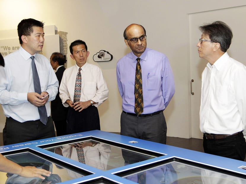 Mr Tharman (second from right) and NTUC secretary-general Lim Swee Say (right) touring the Lifelong Learning Institute yesterday. 
Photo: Wee Teck Hian
