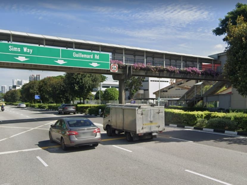 A 64-year-old woman was crossing this overhead bridge along Mountbatten Road when the suspect purportedly approached her from the back, covered her mouth and demanded for money. 
