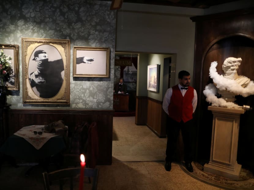 Banksy’s art in West Bank hotel with world’s ‘worst view’