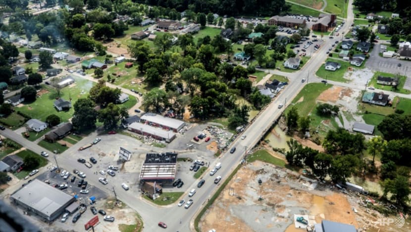 At least 21 dead and dozens missing in Tennessee floods At least 21 dead and dozens missing in Tennessee floods