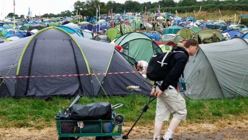 Elated music fans pitch up for Glastonbury, await Elton John