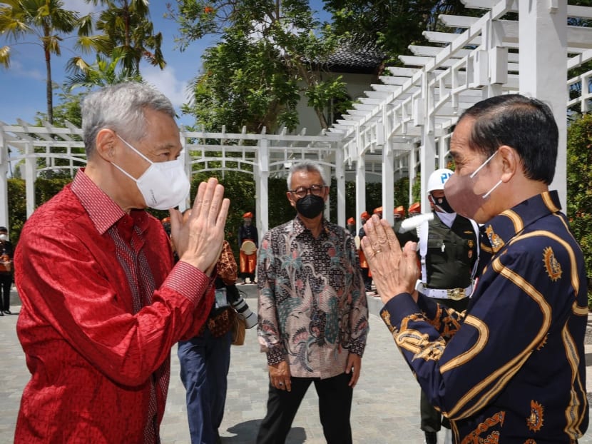 Singapore Prime Minister Lee Hsien Loong (left) and Indonesian President Joko Widodo (right) at a leaders' retreat in Bintan, Indonesia, on Jan 25, 2022. Singapore Prime Minister Lee Hsien Loong (left) and Indonesian President Joko Widodo (right) at a leaders' retreat in Bintan, Indonesia, on Jan 25, 2022.