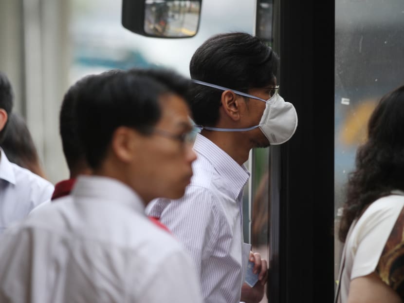 Man seen wearing a mask as air quality remains in the unhealthy range. Photo: Daryl Kang